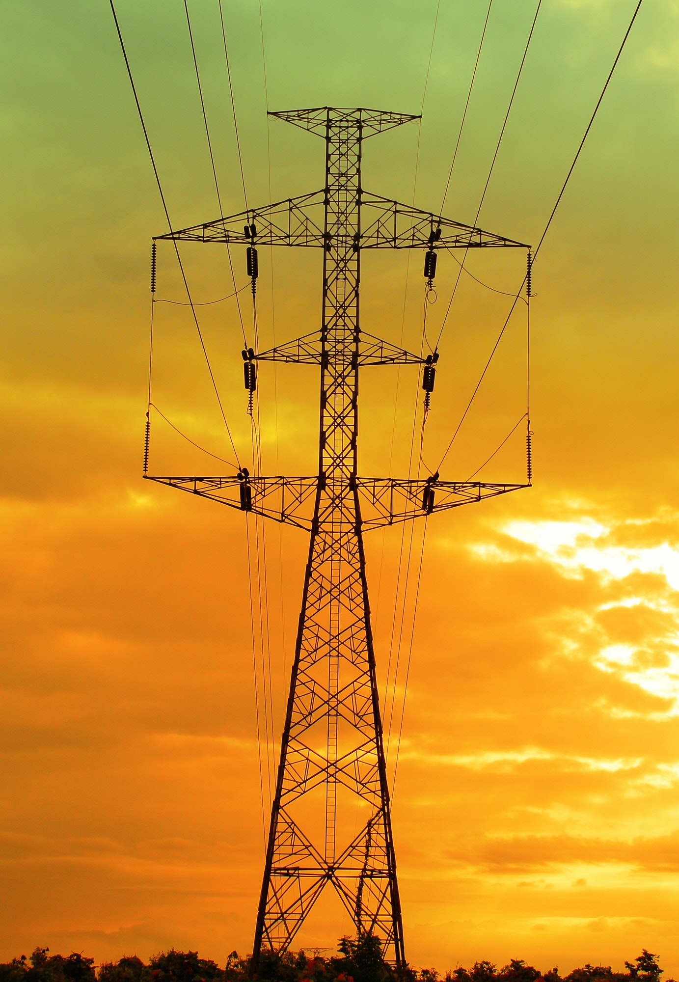 Electricity pylons at sunset